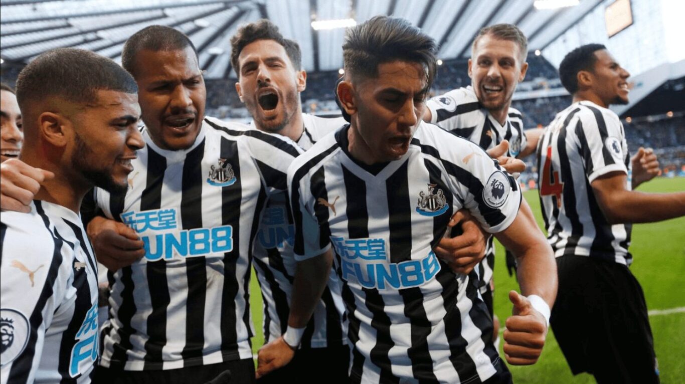 Newcastle United players celebrating used to promote 1xBet Download page